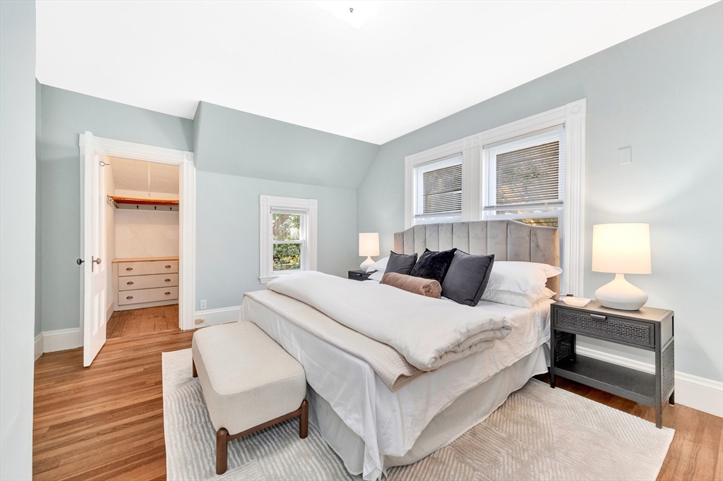 42 St Rose Street Boston, MA 02130 - Photo 19 of 41 a bedroom with a bed and wooden floor