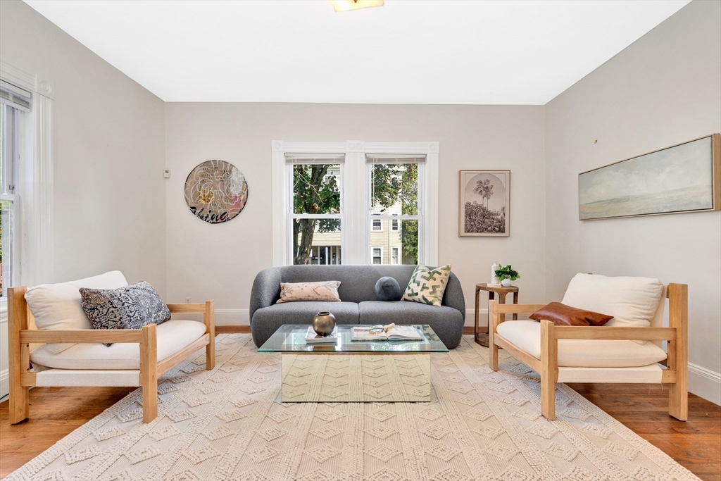 42 St Rose Street Boston, MA 02130 - Photo 2 of 41 a living room with furniture and a window