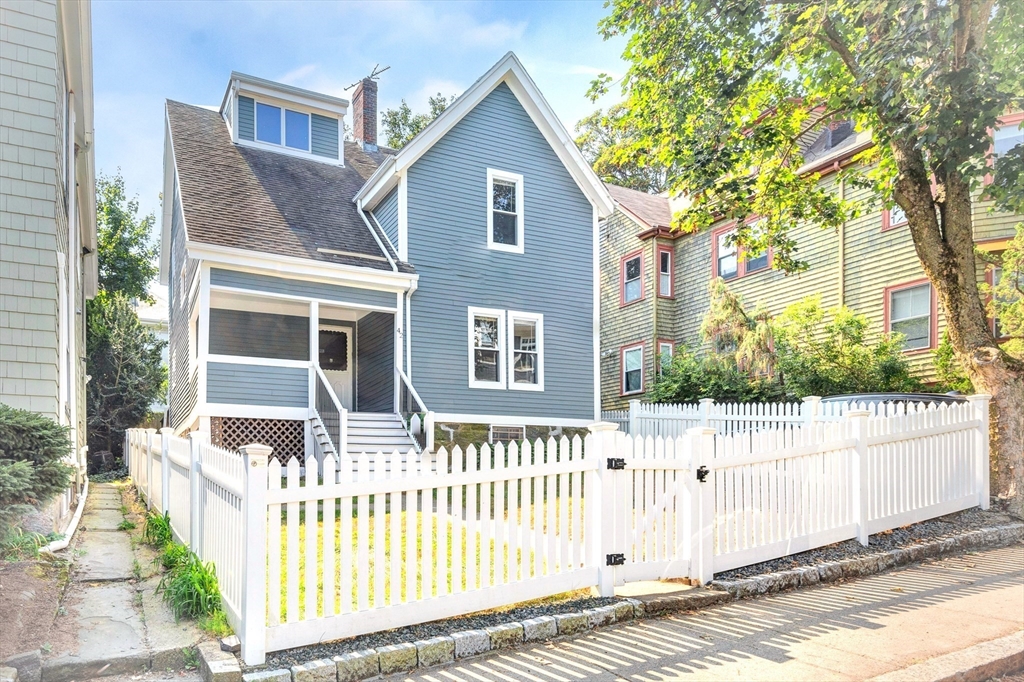 42 St Rose Street Boston, MA 02130 - Photo 31 of 41 a front view of a house with a fence