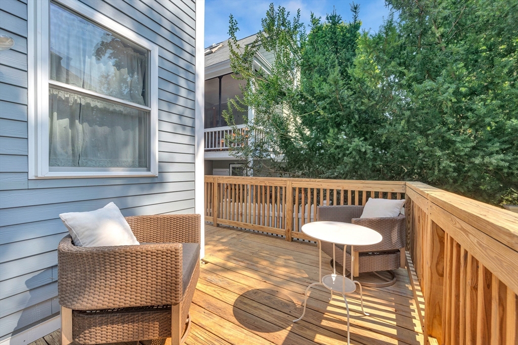 42 St Rose Street Boston, MA 02130 - Photo 35 of 41 a balcony with table and chairs