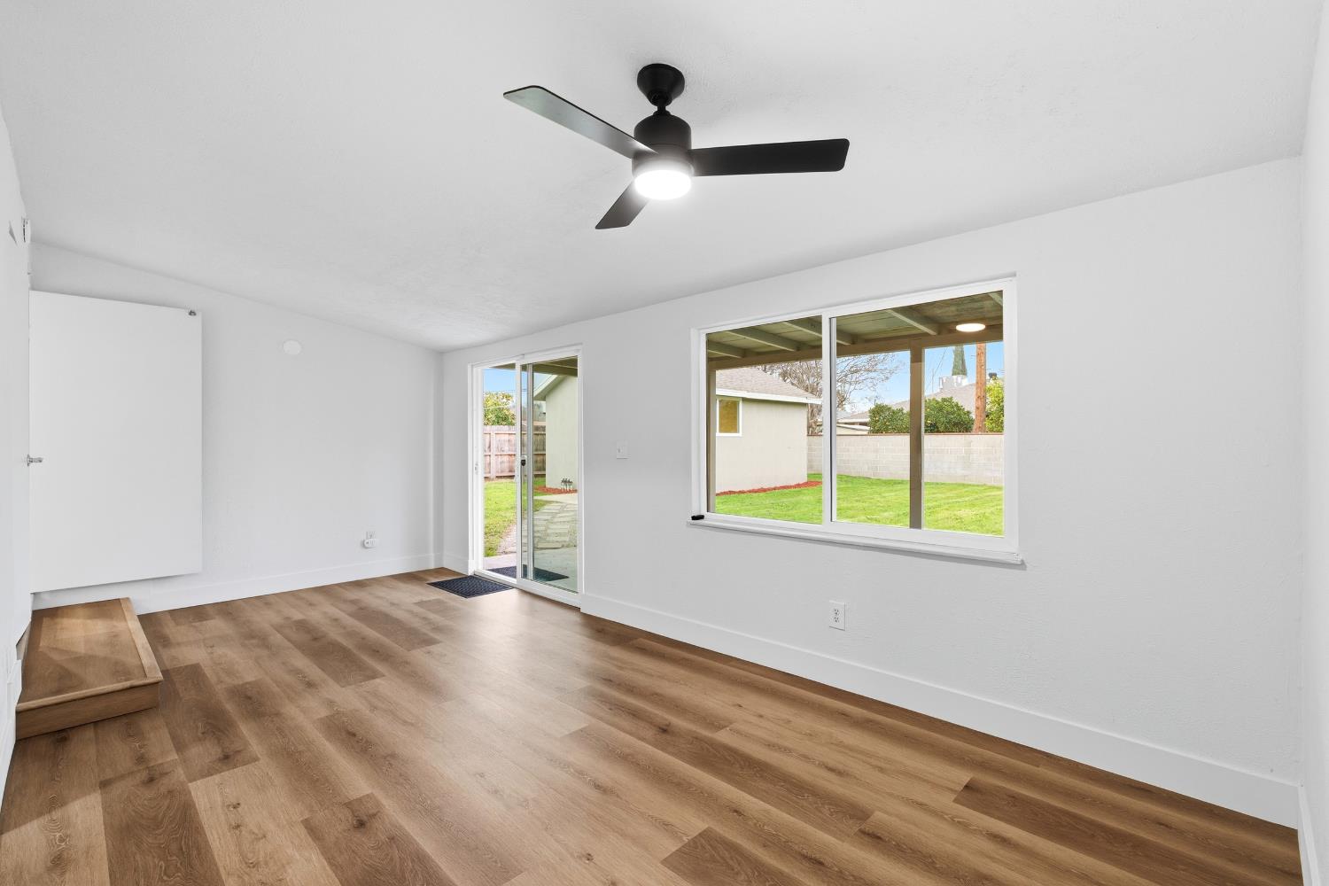 3473 East Dayton Avenue Fresno, CA 93726 - Photo 22 of 49 a view of an empty room with a window