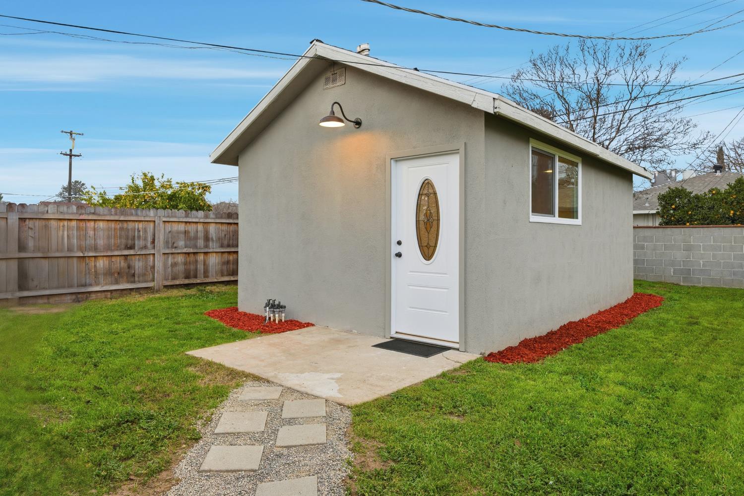 3473 East Dayton Avenue Fresno, CA 93726 - Photo 32 of 49 a backyard of a house with seating space