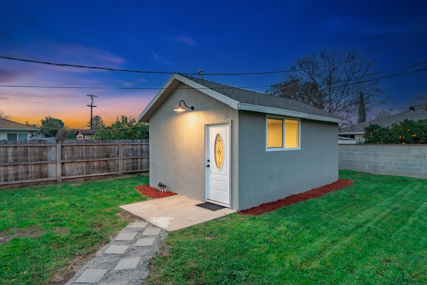 3473 East Dayton Avenue Fresno, CA 93726 - Photo 4 of 49 a front view of a house having yard