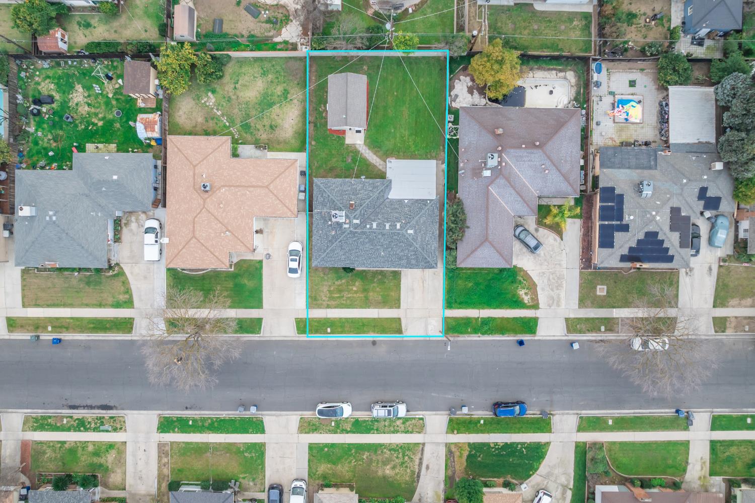 3473 East Dayton Avenue Fresno, CA 93726 - Photo 45 of 49 an aerial view of a house with a yard and lake view