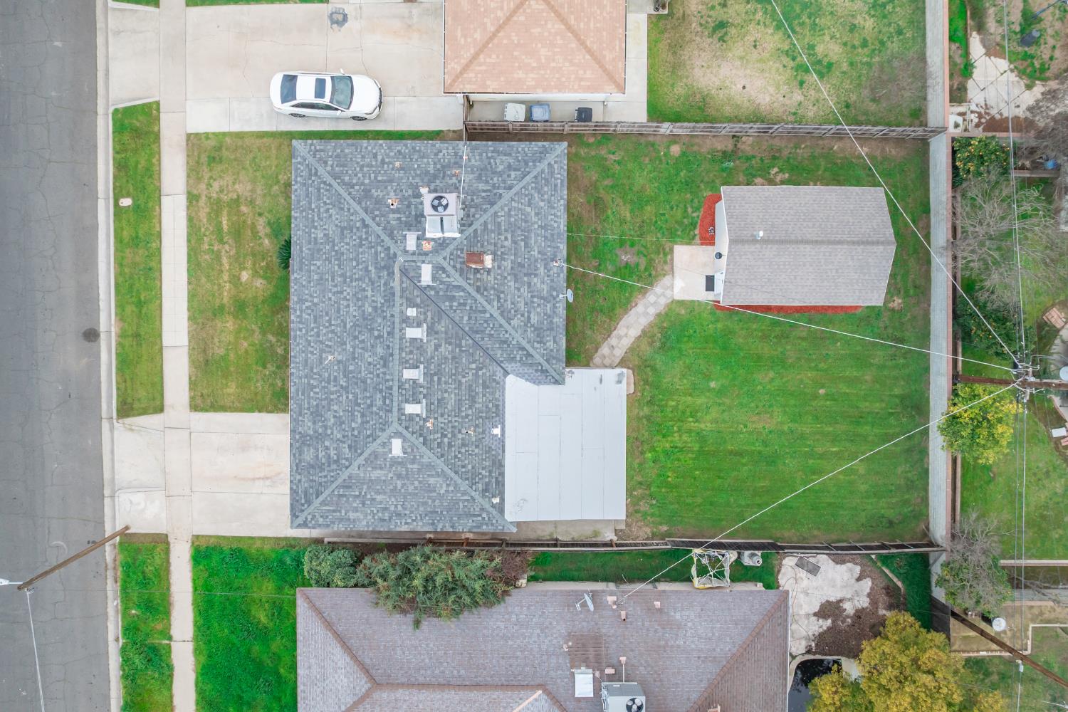 3473 East Dayton Avenue Fresno, CA 93726 - Photo 5 of 49 front view of a house with a small yard
