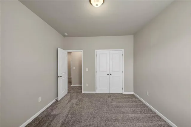 a living room with a couch and a flat screen tv