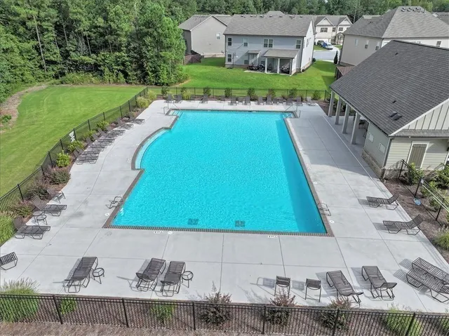 a view of a house with a swimming pool