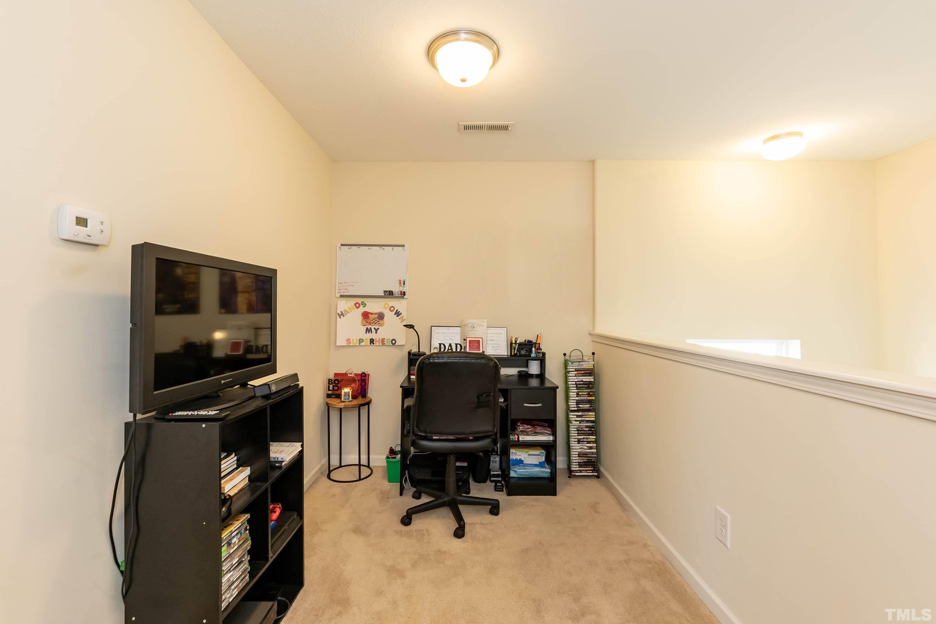 4108 Lady Slipper Lane Durham, NC 27704 - Photo 16 of 33 a view of a workspace with furniture