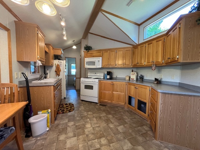 2795 East 28th Road Marseilles, IL 61341 - Photo 6 of 65 a kitchen with granite countertop a sink stainless steel appliances and cabinets