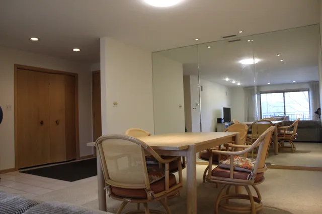 a view of a dining room with furniture