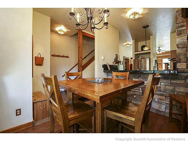 1904 Soda Ridge Road, Unit 1234 Keystone, CO 80435 - Photo 3 of 25 a view of dinning table and chairs