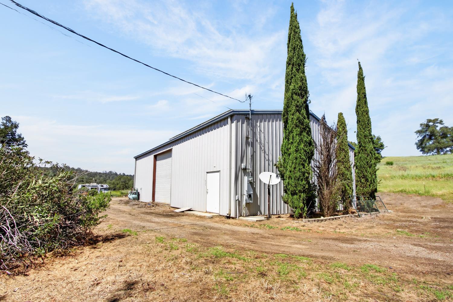 6545 Garden Bar Road Lincoln, CA 95648 - Photo 3 of 25 a view of a house with a yard and plants