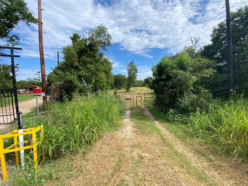 3909 Harrison Street Bellmead, TX 76705 - Photo 2 of 13 a view of yard with green space
