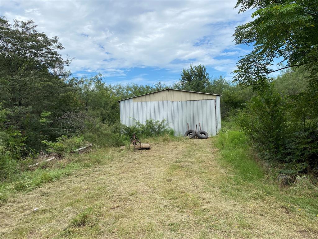 3909 Harrison Street Bellmead, TX 76705 - Photo 7 of 13 a view of a backyard