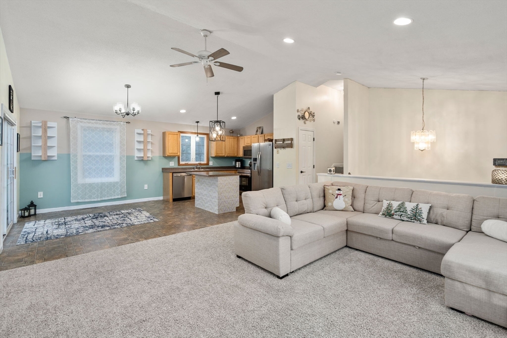 89 Jarvis Avenue Holyoke, MA 01040 - Photo 12 of 27 a living room with furniture and kitchen view