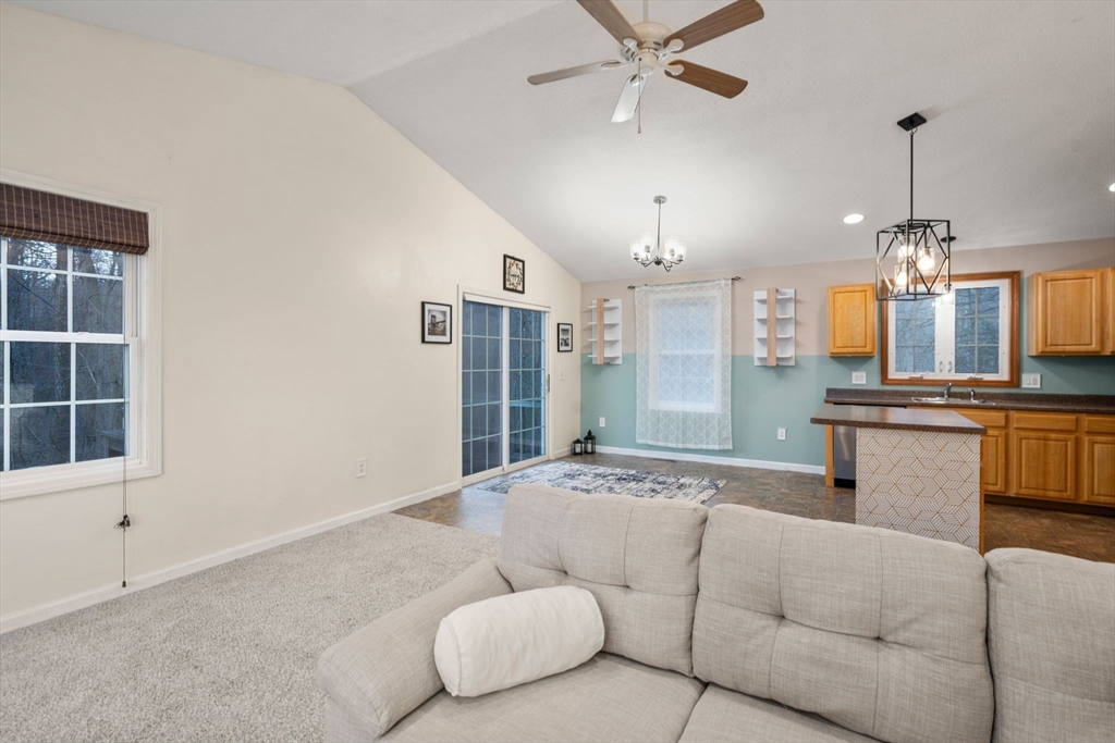 89 Jarvis Avenue Holyoke, MA 01040 - Photo 13 of 27 a living room with furniture and kitchen view