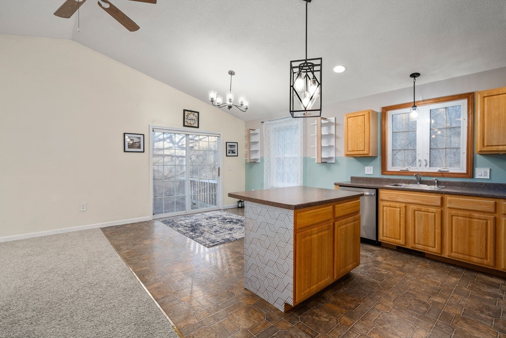 89 Jarvis Avenue Holyoke, MA 01040 - Photo 14 of 27 a large kitchen with stainless steel appliances granite countertop a stove and a sink