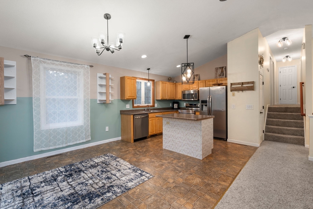89 Jarvis Avenue Holyoke, MA 01040 - Photo 16 of 27 a kitchen with refrigerator and window