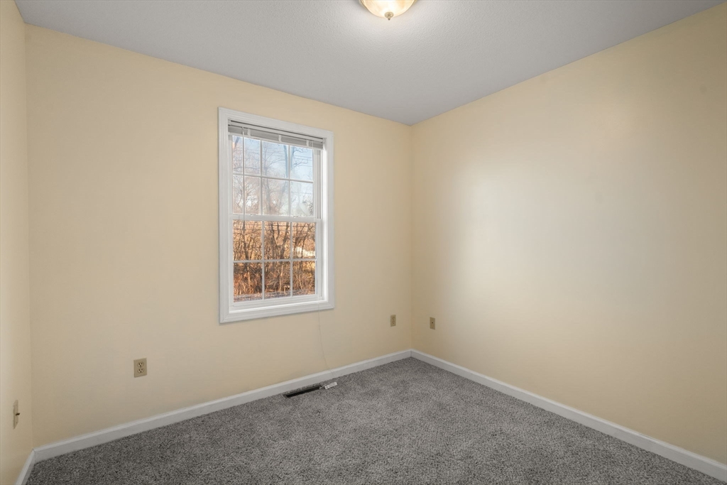 89 Jarvis Avenue Holyoke, MA 01040 - Photo 21 of 27 an empty room with a window