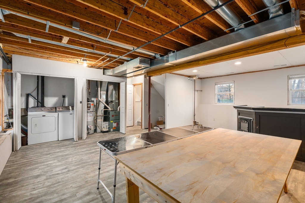 89 Jarvis Avenue Holyoke, MA 01040 - Photo 24 of 27 a kitchen with a stove a refrigerator and a sink