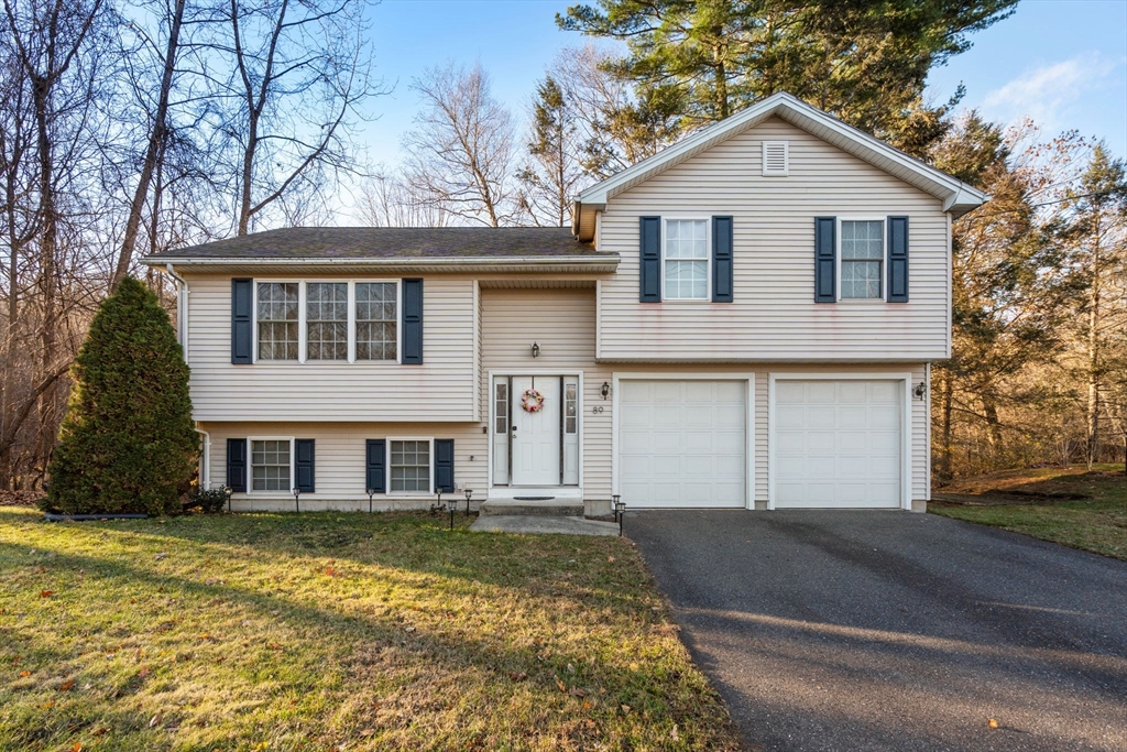 89 Jarvis Avenue Holyoke, MA 01040 - Photo 26 of 27 a front view of a house with a yard
