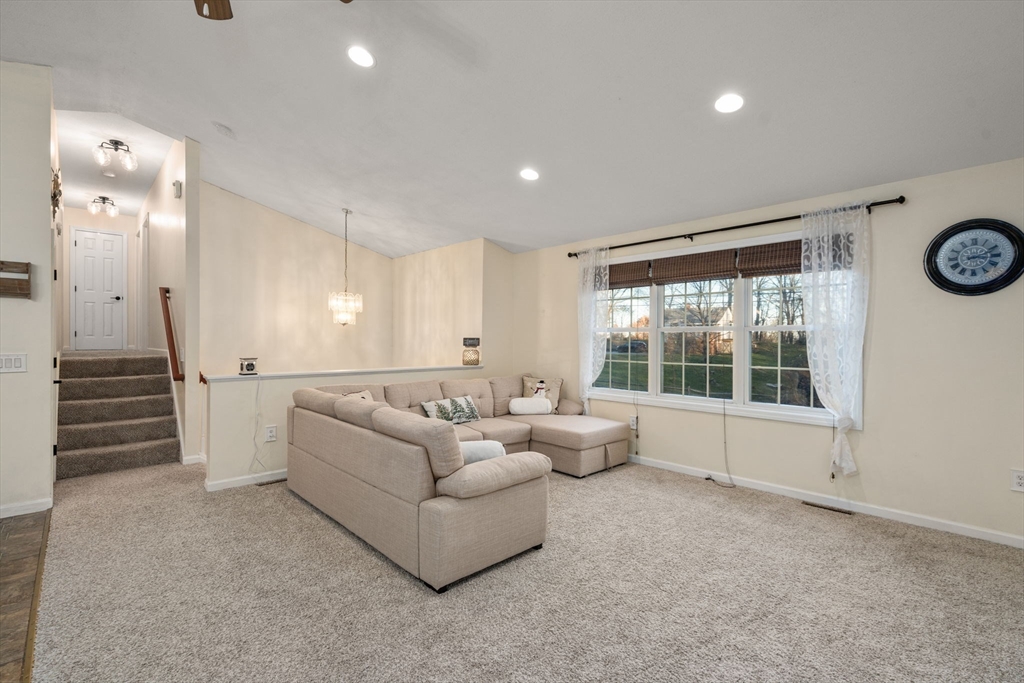 89 Jarvis Avenue Holyoke, MA 01040 - Photo 9 of 27 a living room with furniture and a large window