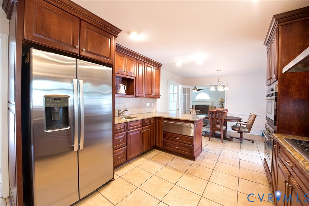 2308 Pleasant Run Drive Henrico, VA 23238 - Photo 13 of 33 Kitchen featuring stainless steel appliances, a pe