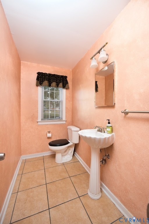 2308 Pleasant Run Drive Henrico, VA 23238 - Photo 15 of 33 Half bath with light tile patterned flooring and a