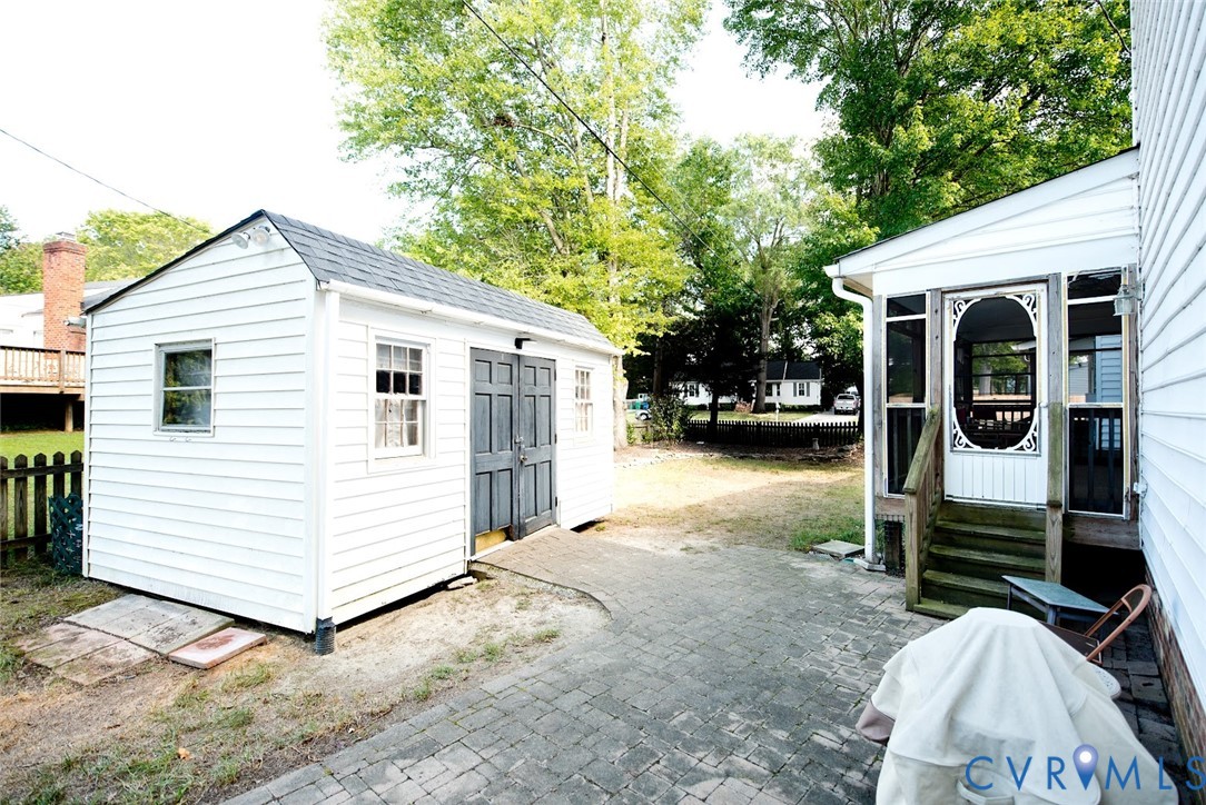 2308 Pleasant Run Drive Henrico, VA 23238 - Photo 31 of 33 View of shed with entry steps and a sunroom