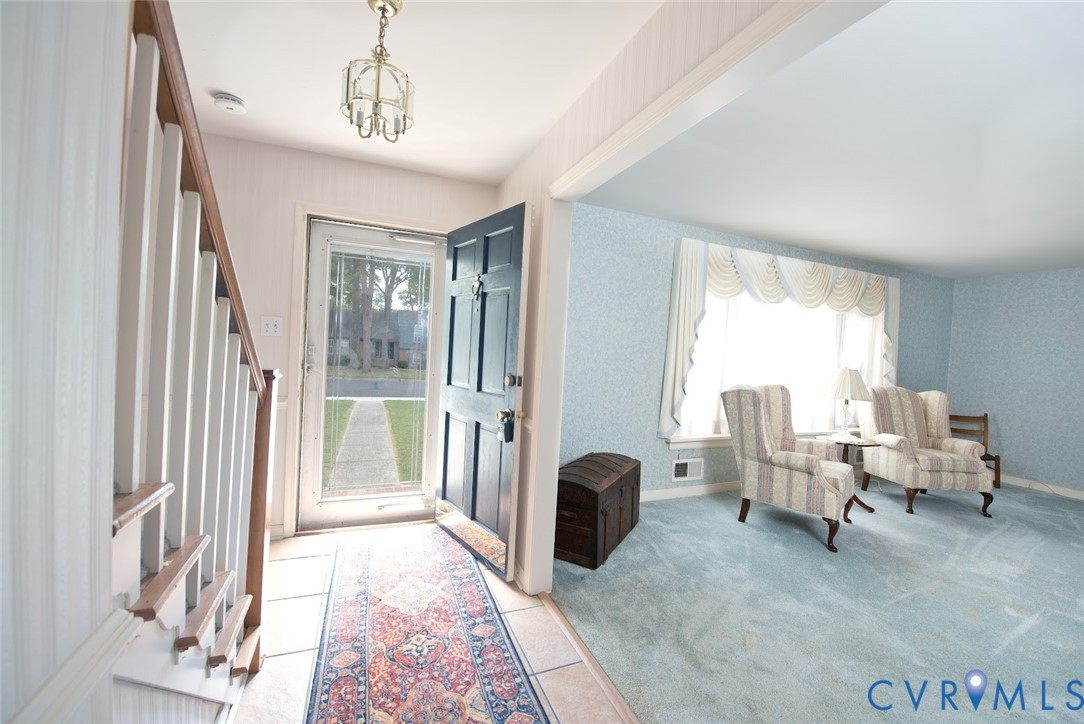 2308 Pleasant Run Drive Henrico, VA 23238 - Photo 5 of 33 Entrance foyer featuring wallpapered walls, light