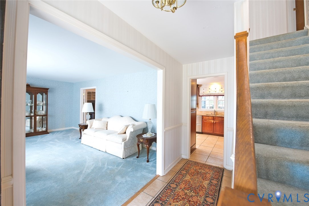 2308 Pleasant Run Drive Henrico, VA 23238 - Photo 6 of 33 Corridor featuring stairs, light colored carpet, w