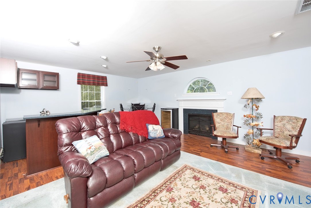 2308 Pleasant Run Drive Henrico, VA 23238 - Photo 8 of 33 Living area featuring dark wood finished floors, a