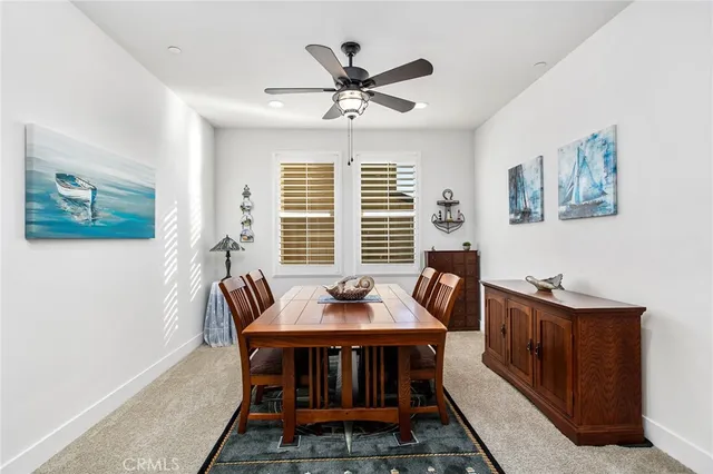 a view of a living room and entryway