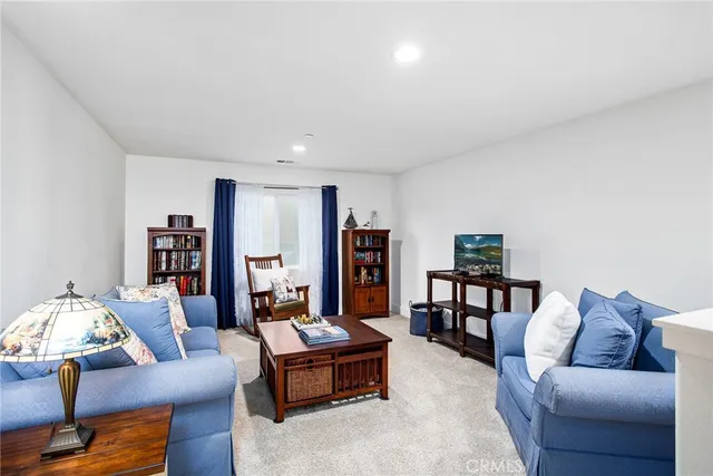 a spacious bathroom with a double vanity sink a mirror and a bathtub