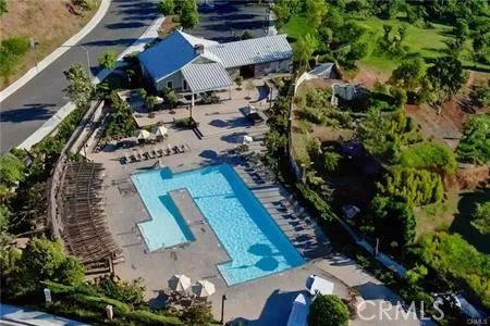 a view of a chair and table of the house