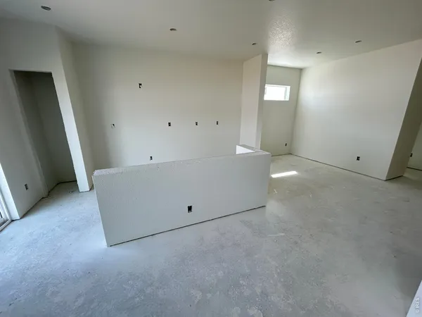 a view of living room and dining room