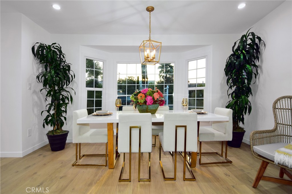 6118 Longridge Avenue Valley Glen, CA 91401 - Photo 11 of 42 a view of a dining room with furniture window and entryway