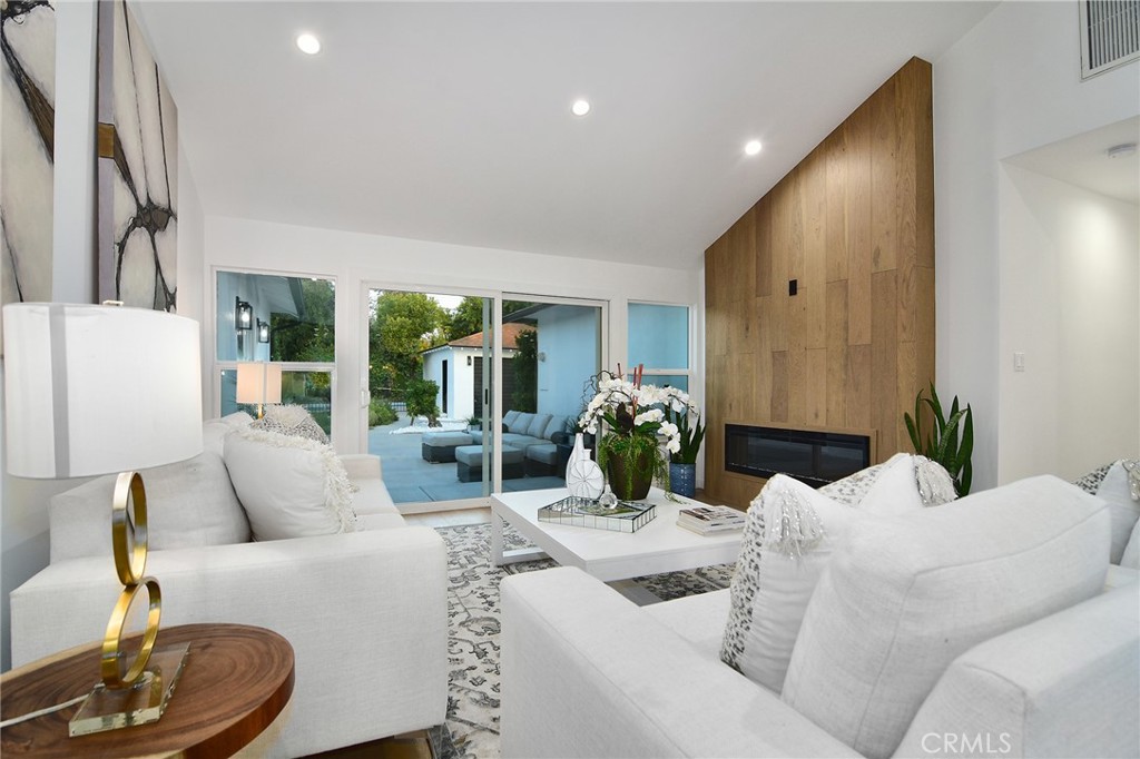 6118 Longridge Avenue Valley Glen, CA 91401 - Photo 14 of 42 a living room with furniture and a potted plant