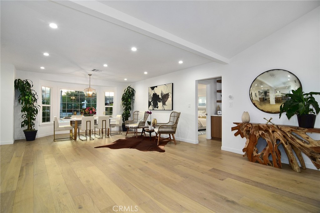 6118 Longridge Avenue Valley Glen, CA 91401 - Photo 18 of 42 a living room with furniture and a large window
