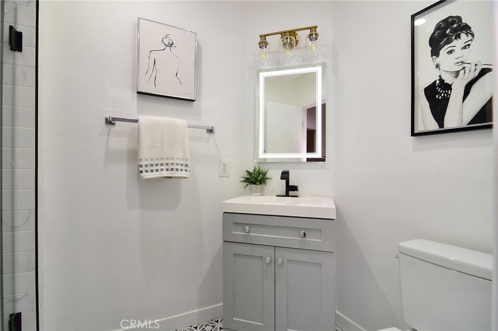 6118 Longridge Avenue Valley Glen, CA 91401 - Photo 23 of 42 a bathroom with a sink and a mirror