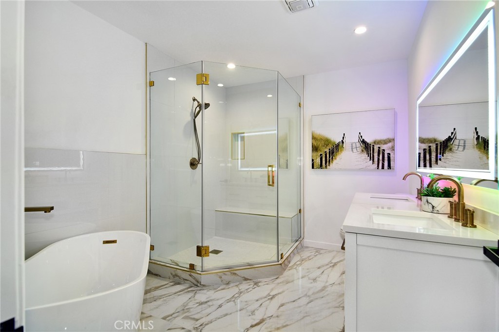 6118 Longridge Avenue Valley Glen, CA 91401 - Photo 26 of 42 a bathroom with a sink a toilet and shower