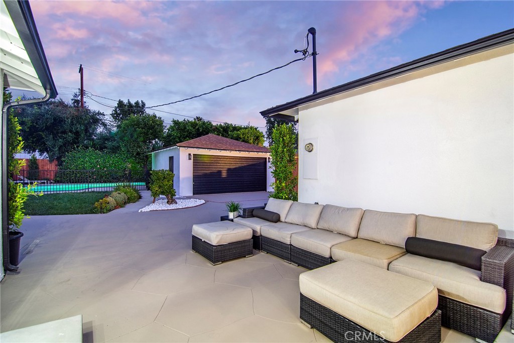 6118 Longridge Avenue Valley Glen, CA 91401 - Photo 28 of 42 a living room with furniture and a fireplace
