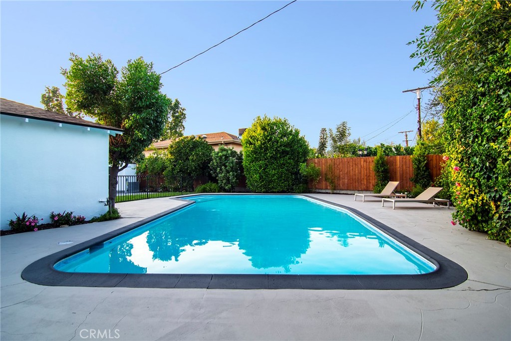 6118 Longridge Avenue Valley Glen, CA 91401 - Photo 34 of 42 a view of a pool in the backyard of house