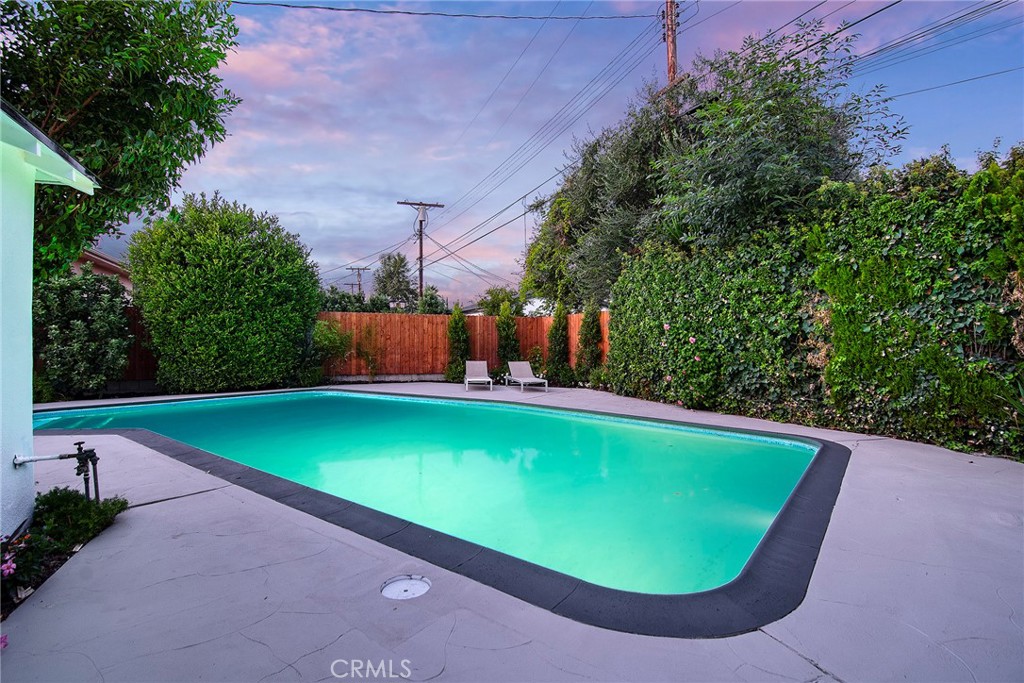 6118 Longridge Avenue Valley Glen, CA 91401 - Photo 35 of 42 a view of a pool in a backyard