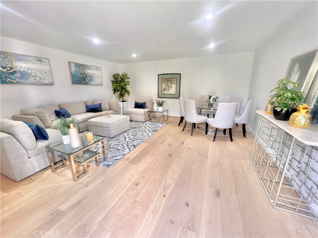 6118 Longridge Avenue Valley Glen, CA 91401 - Photo 38 of 42 a living room with furniture and wooden floor