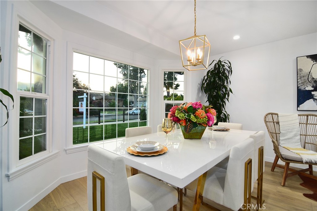 6118 Longridge Avenue Valley Glen, CA 91401 - Photo 10 of 42 a view of a dining room with furniture window and outside view