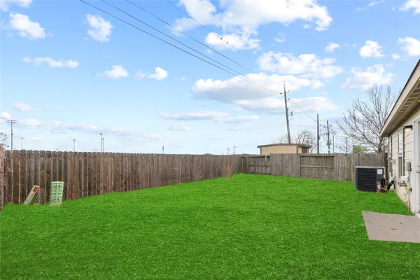 a view of a yard with a slide