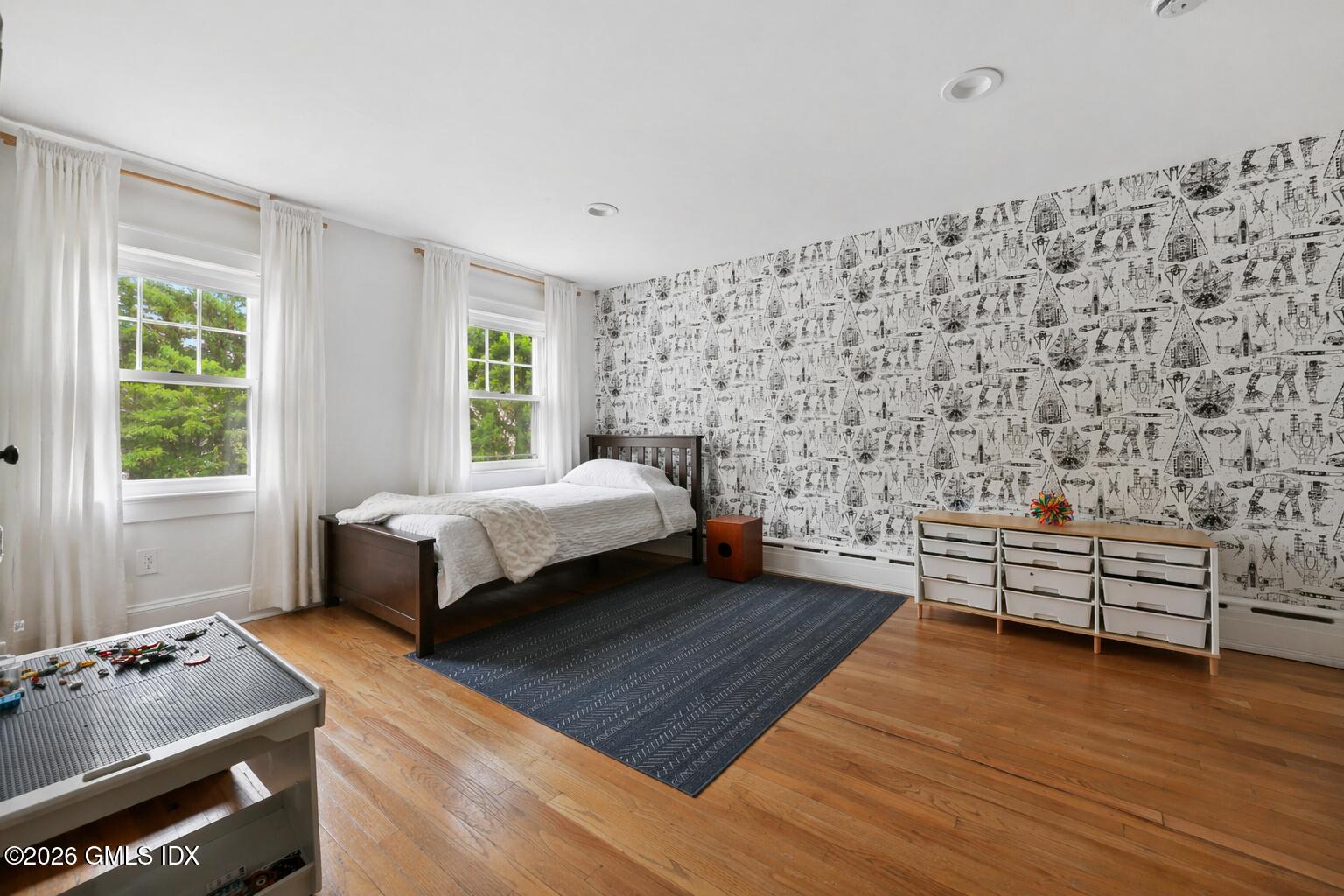 64 Summit Road Riverside, CT 06878 - Photo 22 of 34 a bedroom with a bed and a window