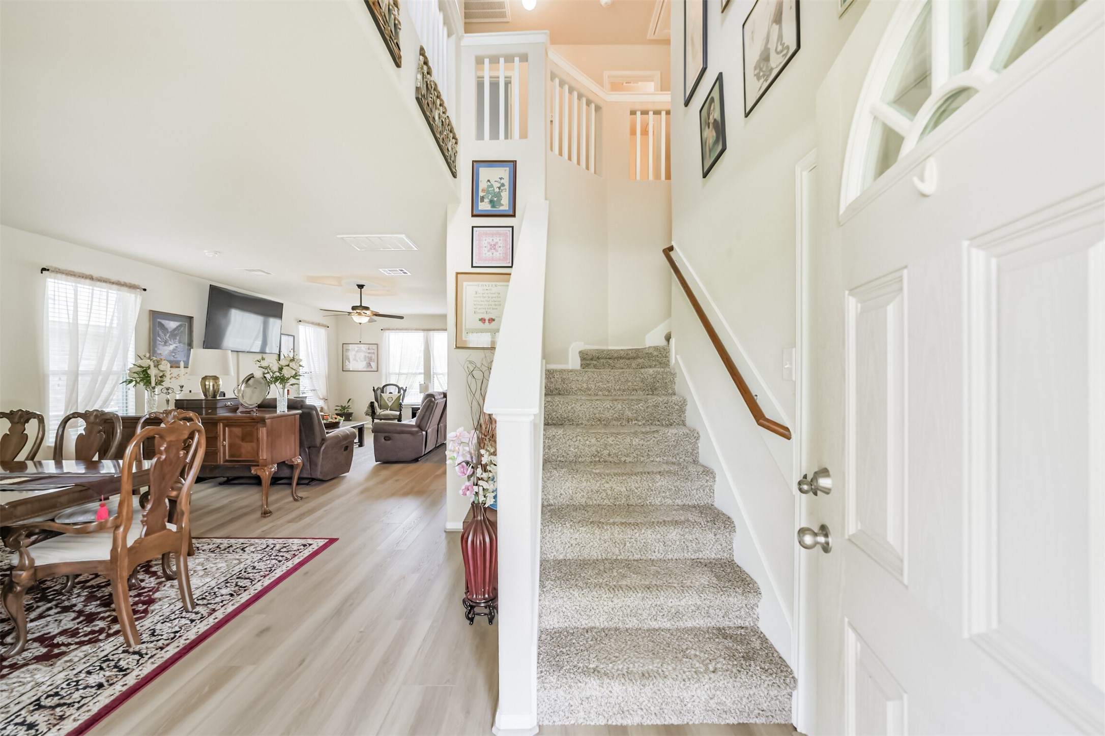 12009 La Salle River Road Conroe, TX 77304 - Photo 6 of 50 a view of entryway and hall with wooden floor