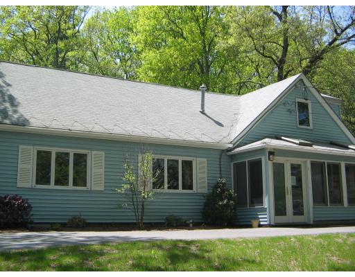 1 Taylor Road Maynard, MA 01754 - Photo 1 of 18 a house view with a garden space